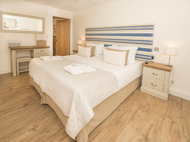 Ground floor bedroom with large double bed which can be made up as 2 singles