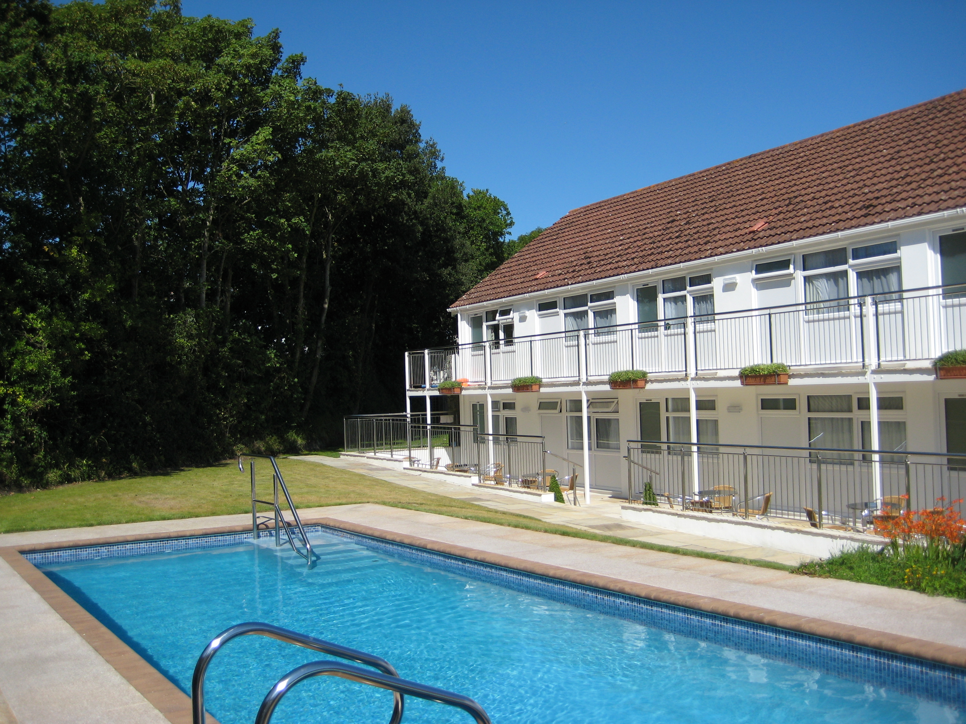 Outside lawn area and swimming pool