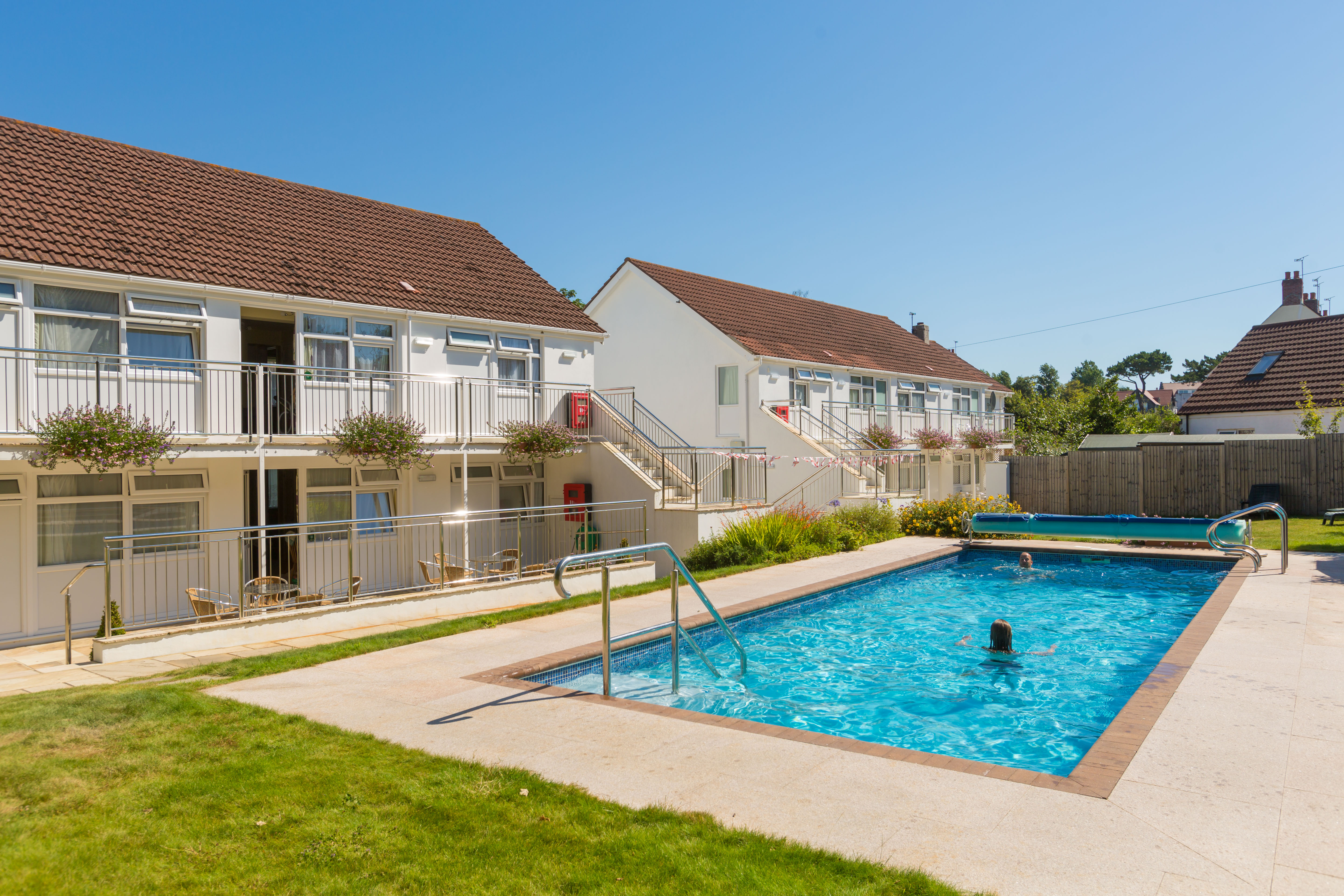 Outside lawn area and swimming pool