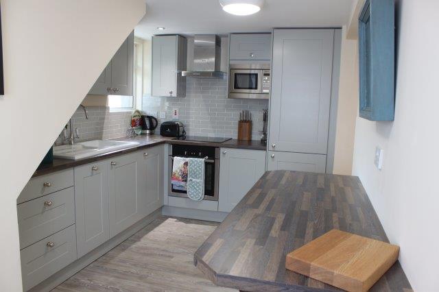 Fully fitted kitchen with breakfast bar