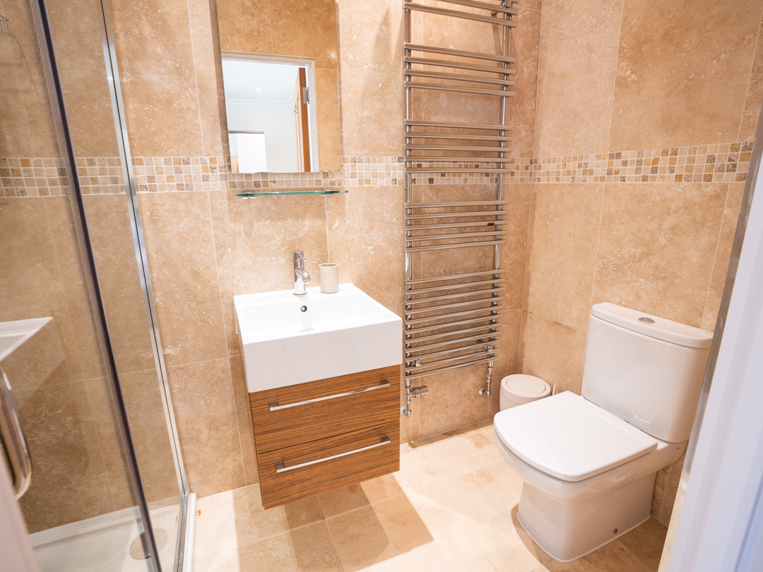 Master Ensuite with shower, basin and WC