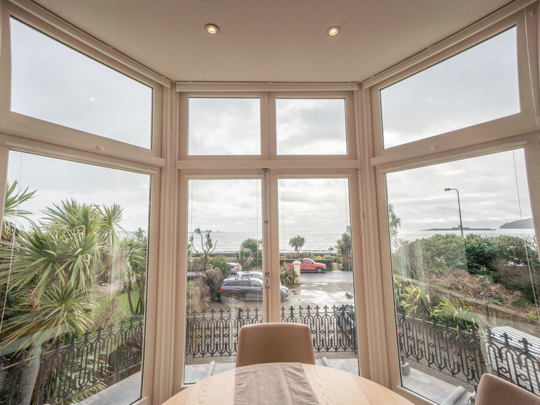 Views over St Aubin's Bay from the dining area