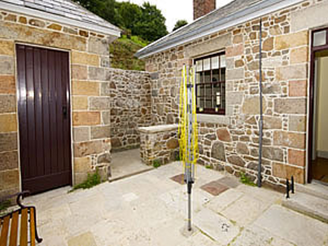 Courtyard off kitchen with outside toilet