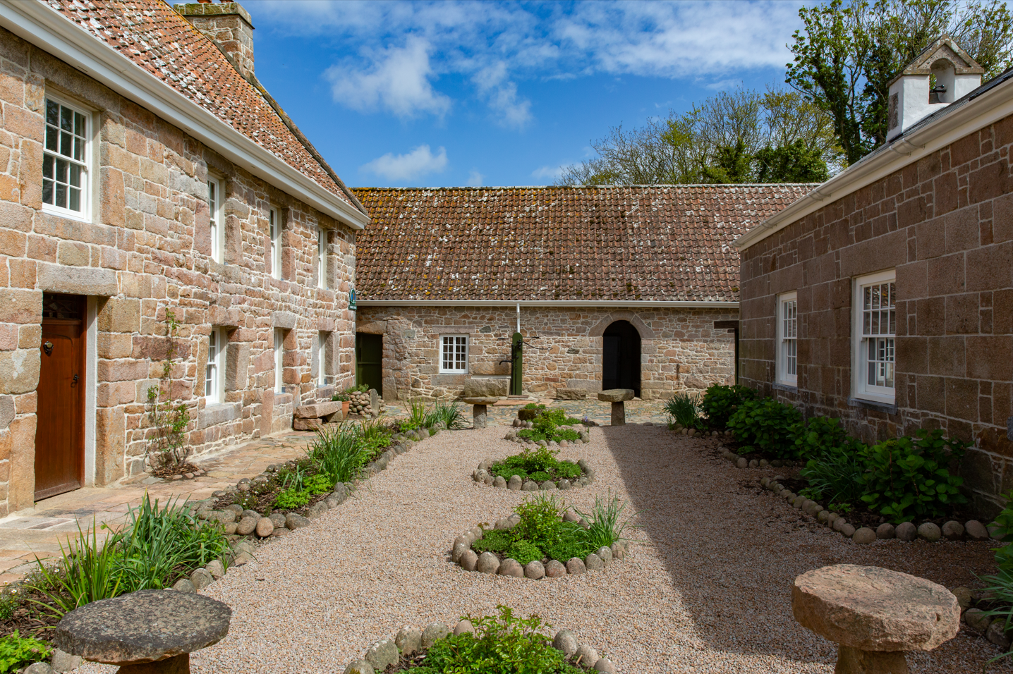 Courtyard area -The Farmhouse is on the left and the Chapel on the right