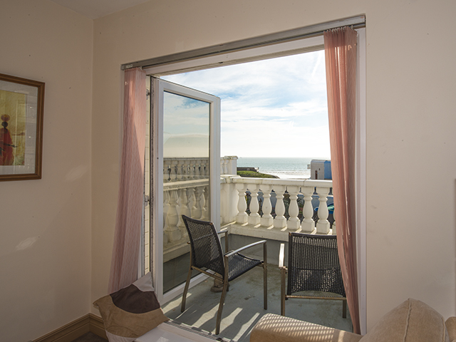 The balcony overlooks the sea on the south coast