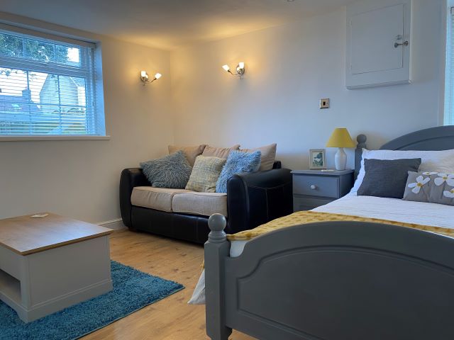 Open plan lounge and bedroom