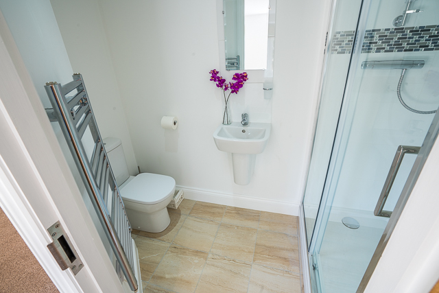 En-suite with large shower, sink and toilet 