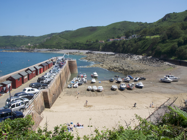 Bonne Nuit Bay has a small sandy beach beside the harbour