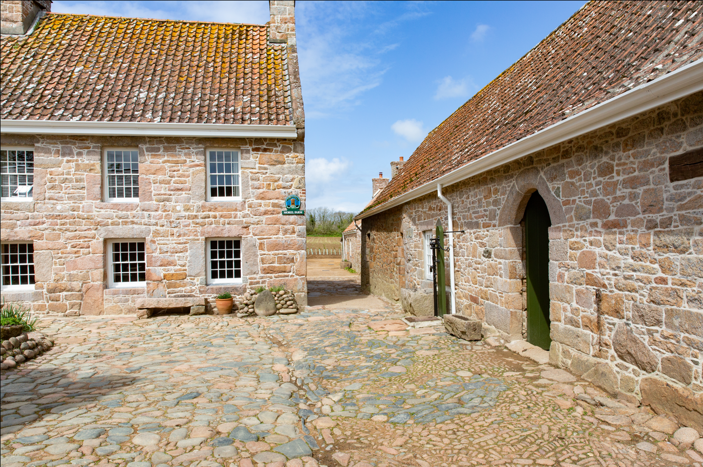 Courtyard - The Farmhouse is front and the Pressoir to the right.  The Bakehouse is in the distance on the right.