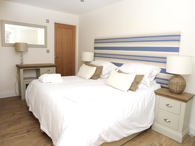 All cottages have a large double bedroom on the ground floor with an ensuite bathroom