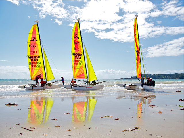 Hobie cats on the beach at St Aubin's bay