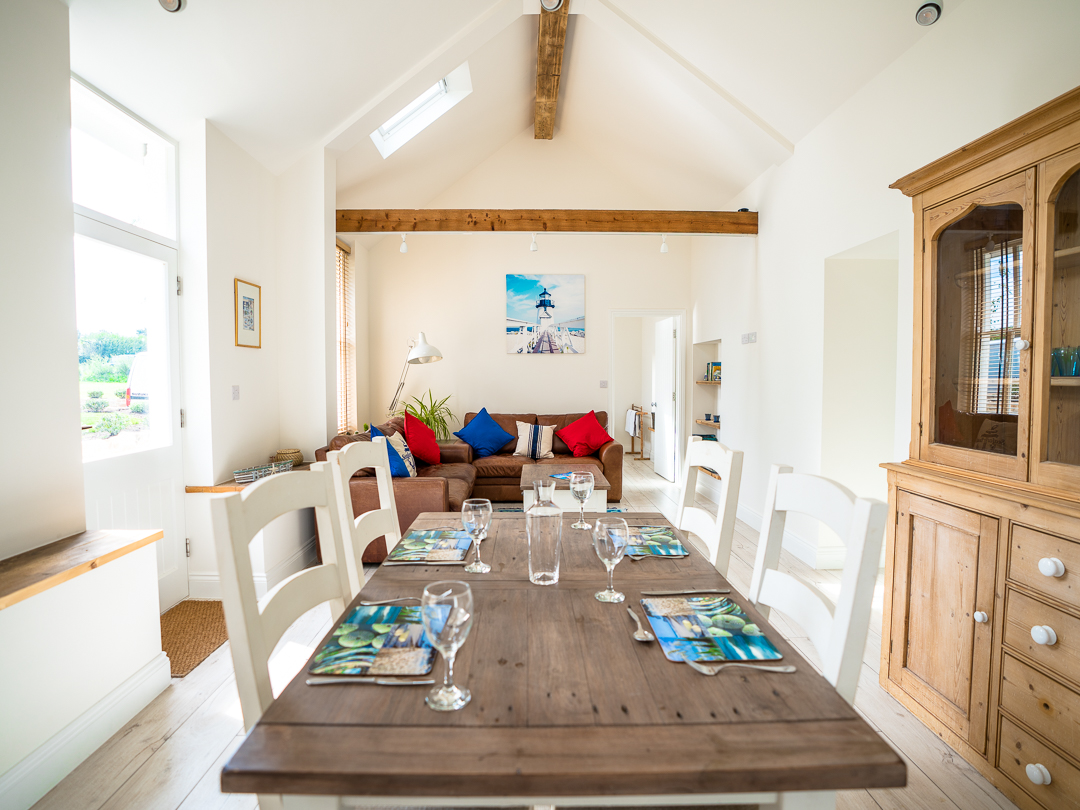 Dining area, lounge and entrance to master bedroom