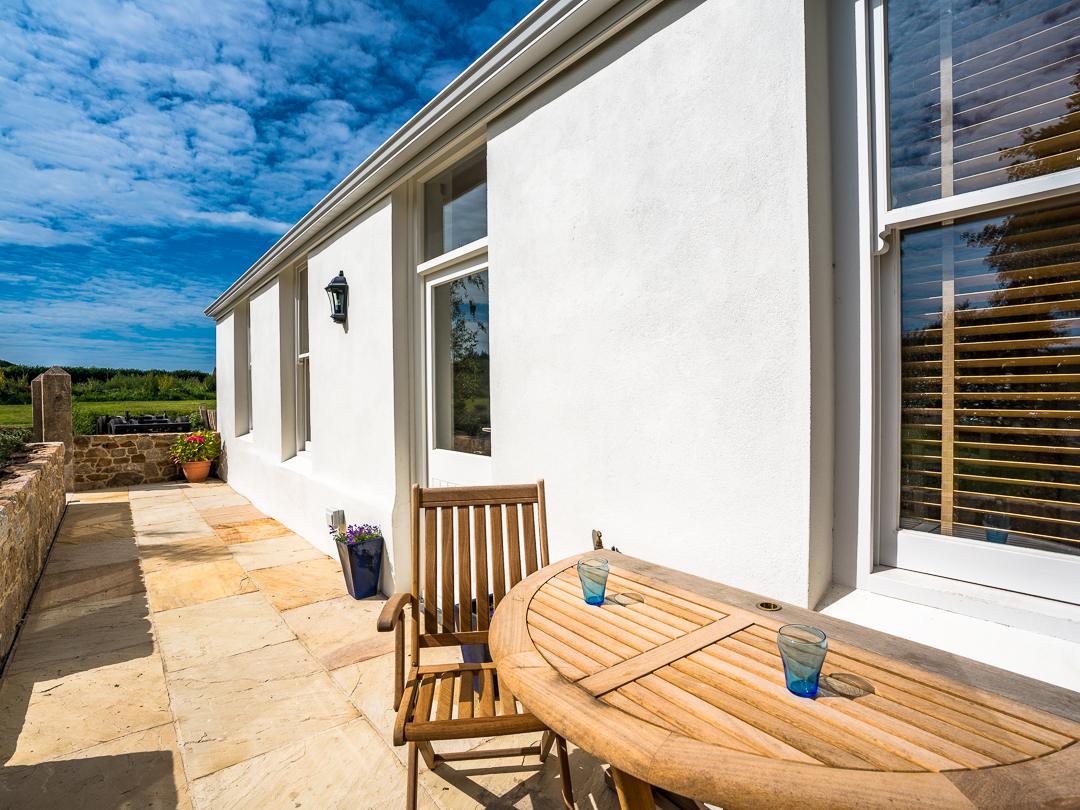 Cottage entrance with patio