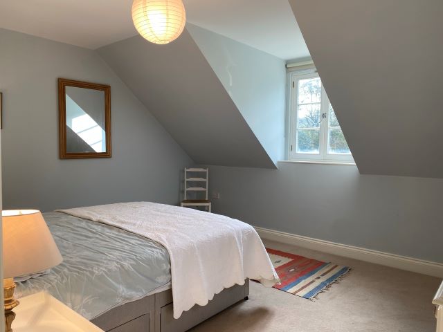 Master bedroom with views over south facing garden