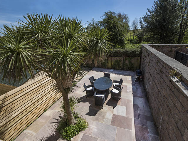 View of patio from south facing double bedroom