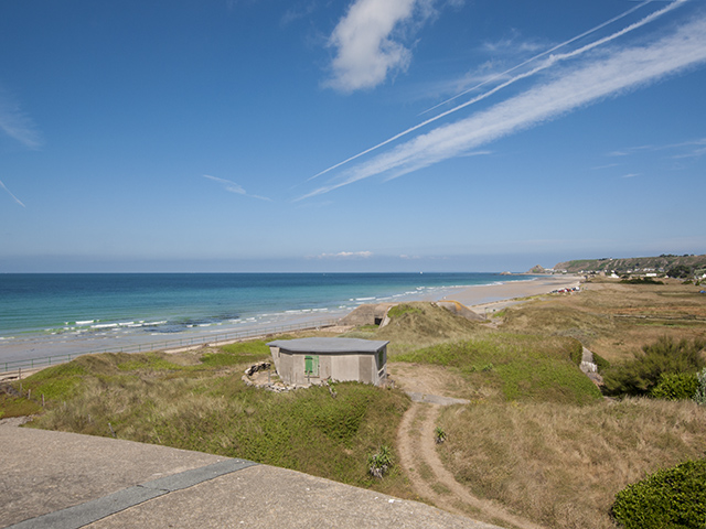 Views over St Ouen's bay looking north towards Guernsey and the other Channel islands