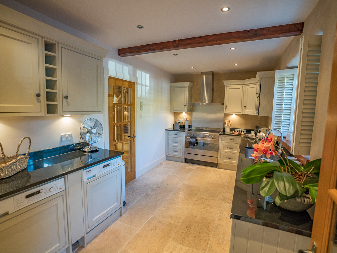 Spacious kitchen with washing machine and dish washer